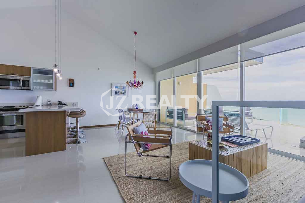Living room kitchen condo at blue residence aruba