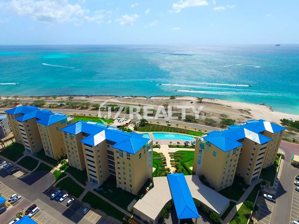 Blue Condominium For Sale aereal view to the Eagle beach CAribbean Sea