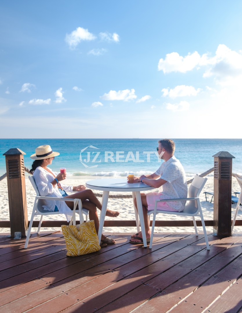 buying a property and living in aruba