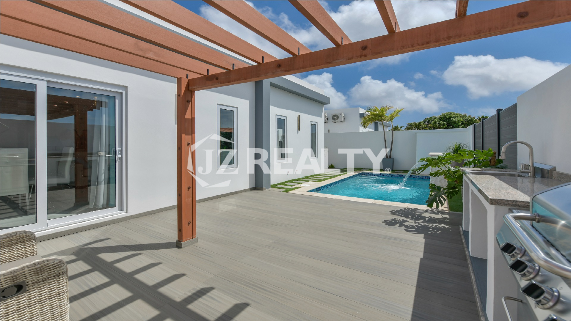 poolside-dining-area-in-reina-sophia-residence.jpg
