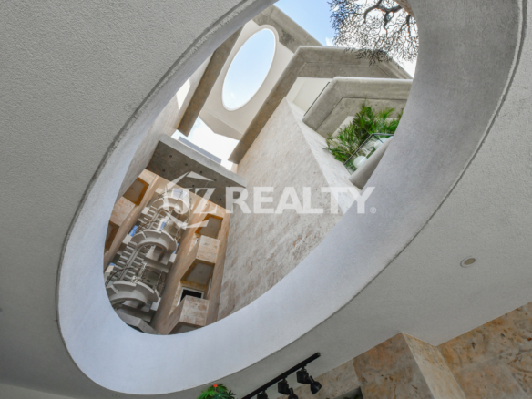 This image highlights the modern skylight and striking architectural elements of Coral Shell Condo in Aruba, emphasizing its contemporary and luxurious design from a disciple of Gaudi
