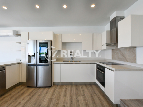 Contemporary kitchen with high-end appliances in Condo 1H, Coral Shell Condominium, Aruba.