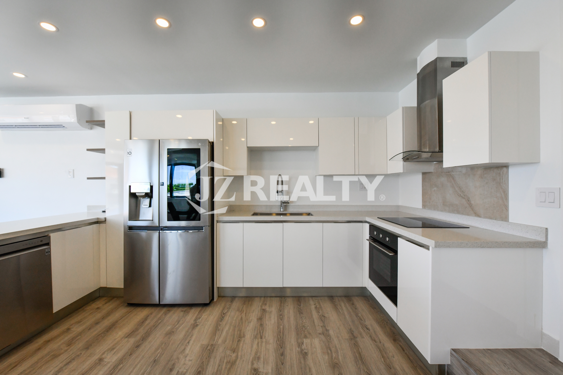 Contemporary kitchen with high-end appliances in Condo 1H, Coral Shell Condominium, Aruba.