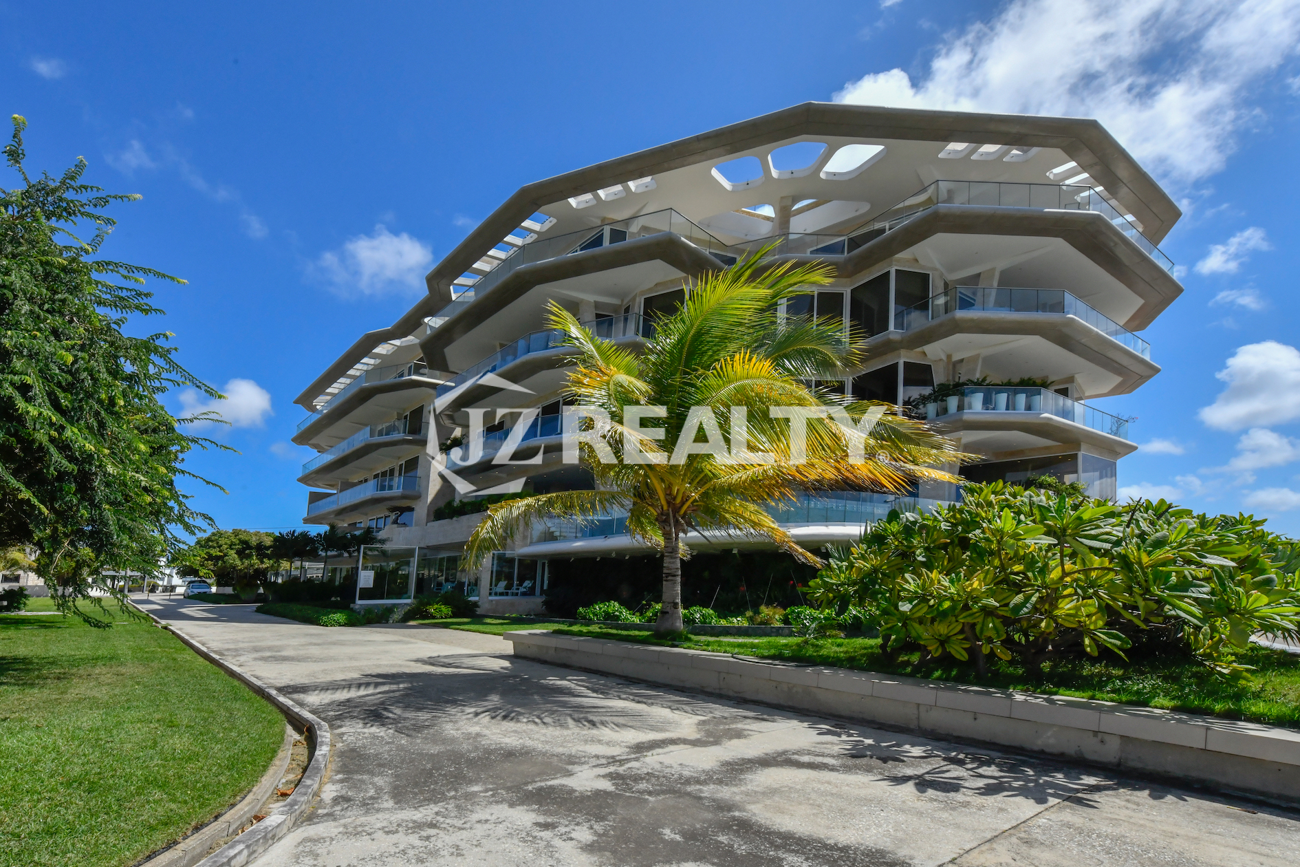 Coral Shell Condo in Aruba showcases unique architectural elements inspired by Spanish Gaudí-style design.