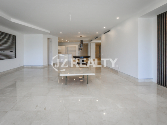 Cozy bedroom with abundant natural light and minimalist decor at Coral Shell Condo GF-C, Oranjestad, Aruba.