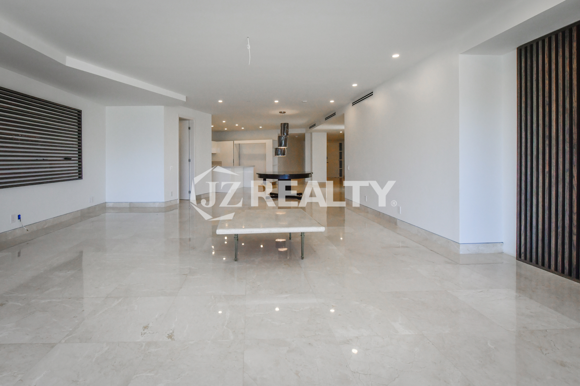 Cozy bedroom with abundant natural light and minimalist decor at Coral Shell Condo GF-C, Oranjestad, Aruba.