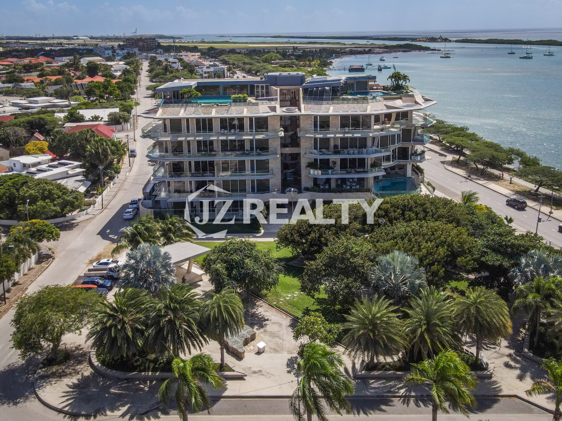 Coral Shell Condo in Oranjestad, Aruba, featuring expansive terraces with breathtaking ocean views.