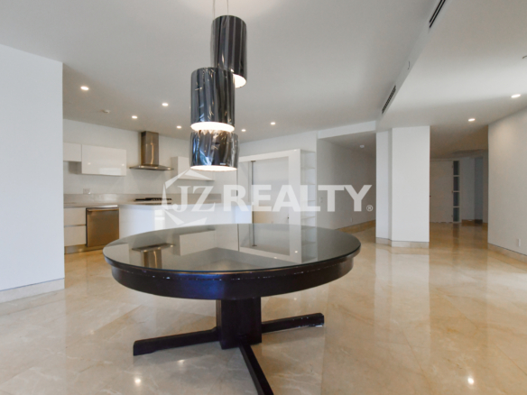 Stylish luxury bathroom with glass-enclosed shower and floating vanity at Coral Shell Condo GF-C, Oranjestad, Aruba.