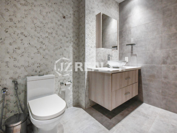 Elegant bathroom design at Coral Shell Condo GF-C with high-end fixtures and marble tiles.