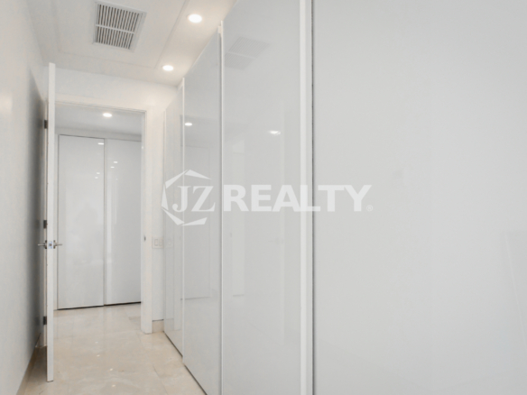 Sleek hallway with modern built-in closets at Coral Shell Condo GF-C in Oranjestad, Aruba.