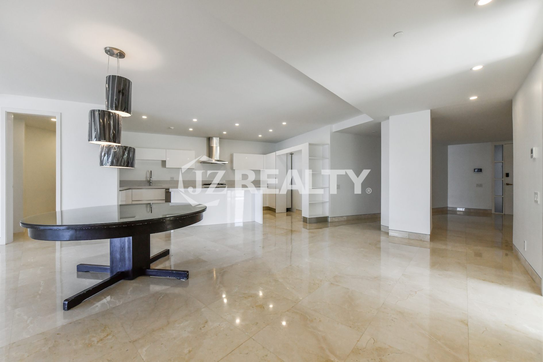 Luxurious bathroom at Coral Shell Condo GF-C with marble finishes and glass shower.