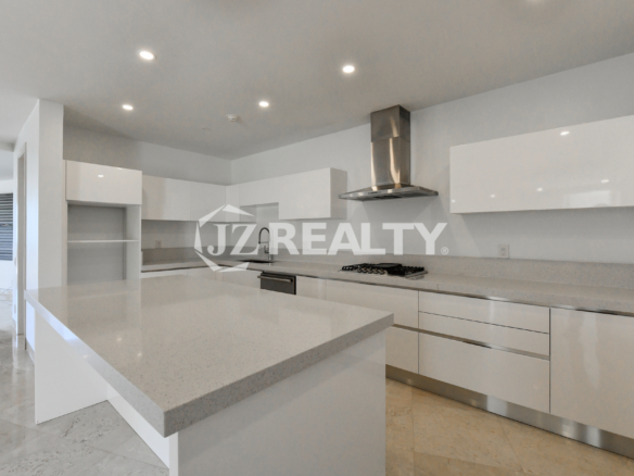 Spacious open-concept kitchen and dining area at Coral Shell Condo GF-C, featuring high-end finishes.