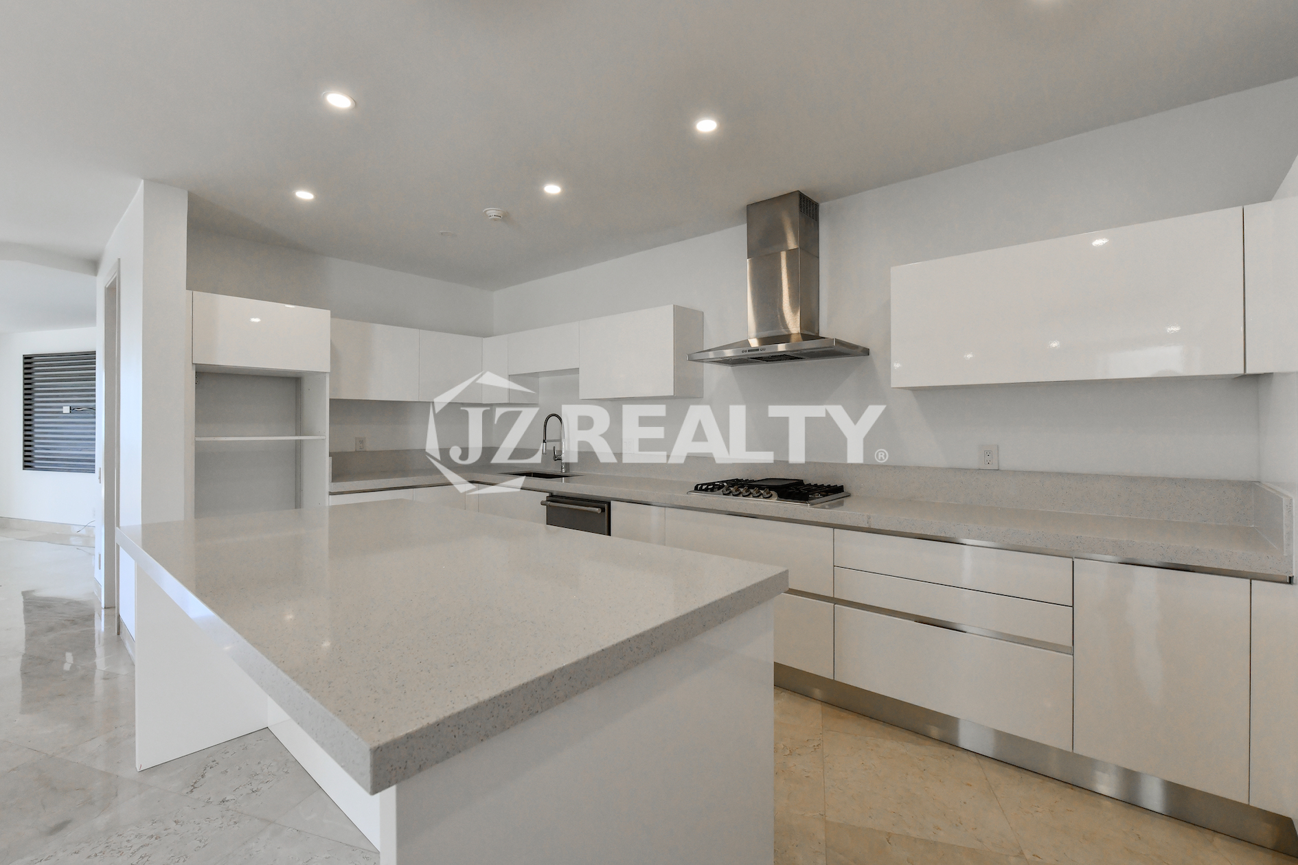 Spacious open-concept kitchen and dining area at Coral Shell Condo GF-C, featuring high-end finishes.