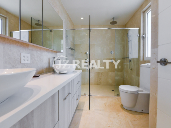 Private outdoor spa bathtub at Coral Shell Condo GF-C with oceanfront views.