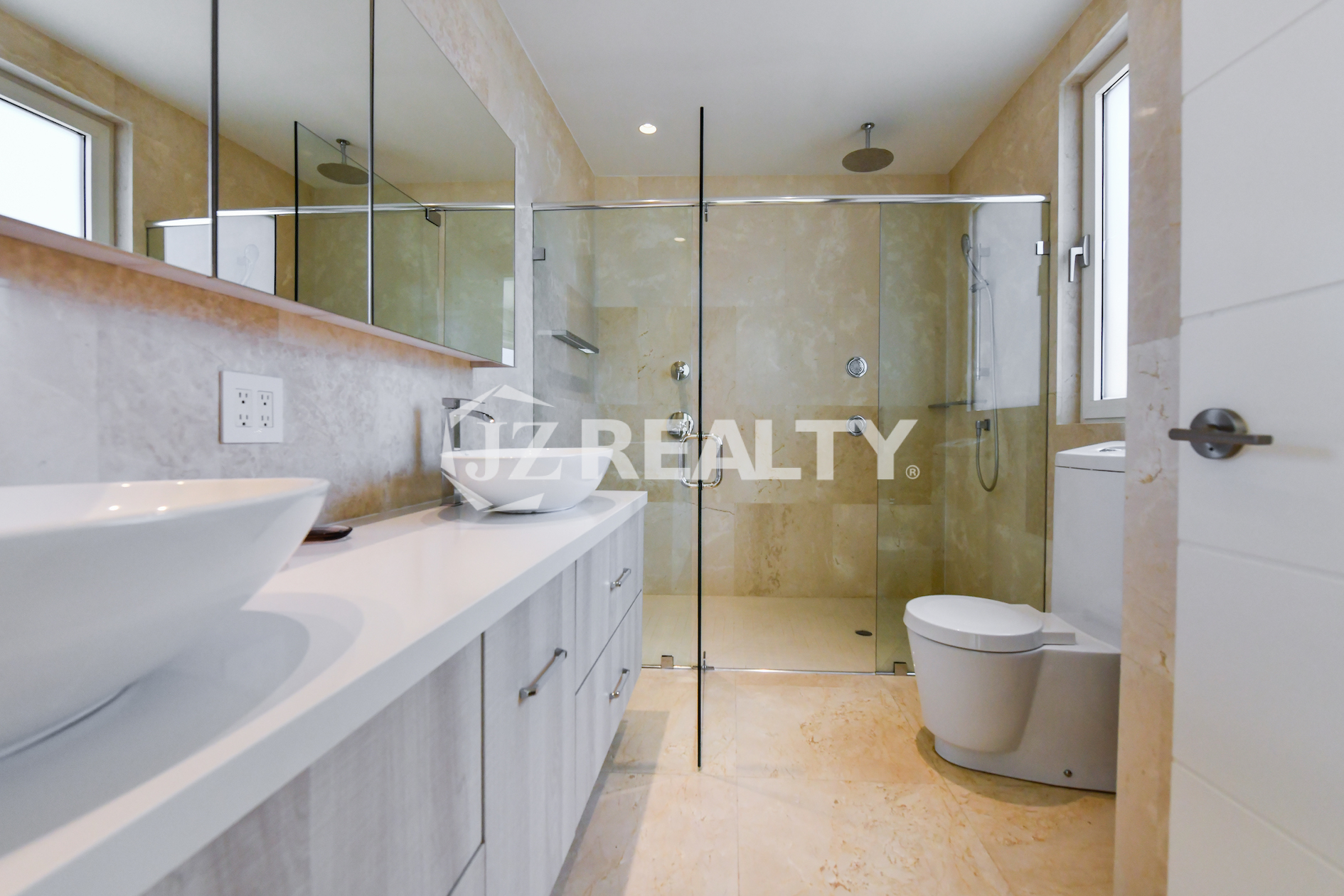 Private outdoor spa bathtub at Coral Shell Condo GF-C with oceanfront views.