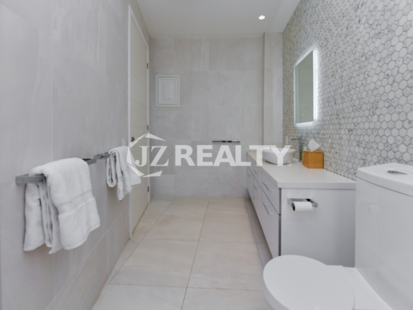 High-end luxury bathroom at Coral Shell Oceanfront Penthouse B, featuring a stylish modern design and premium finishes.