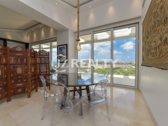 High-end interior design with marble flooring and elegant furnishings at Coral Shell Penthouse B.