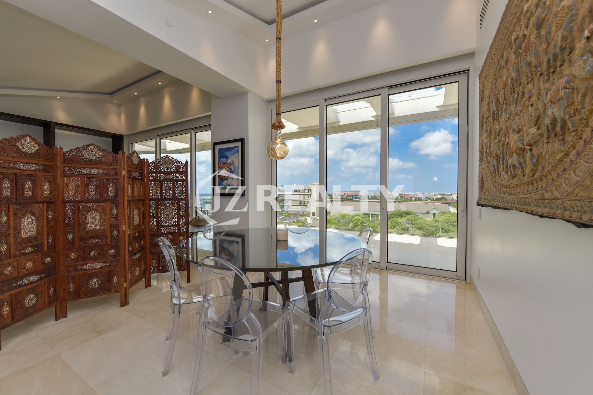 High-end interior design with marble flooring and elegant furnishings at Coral Shell Penthouse B.