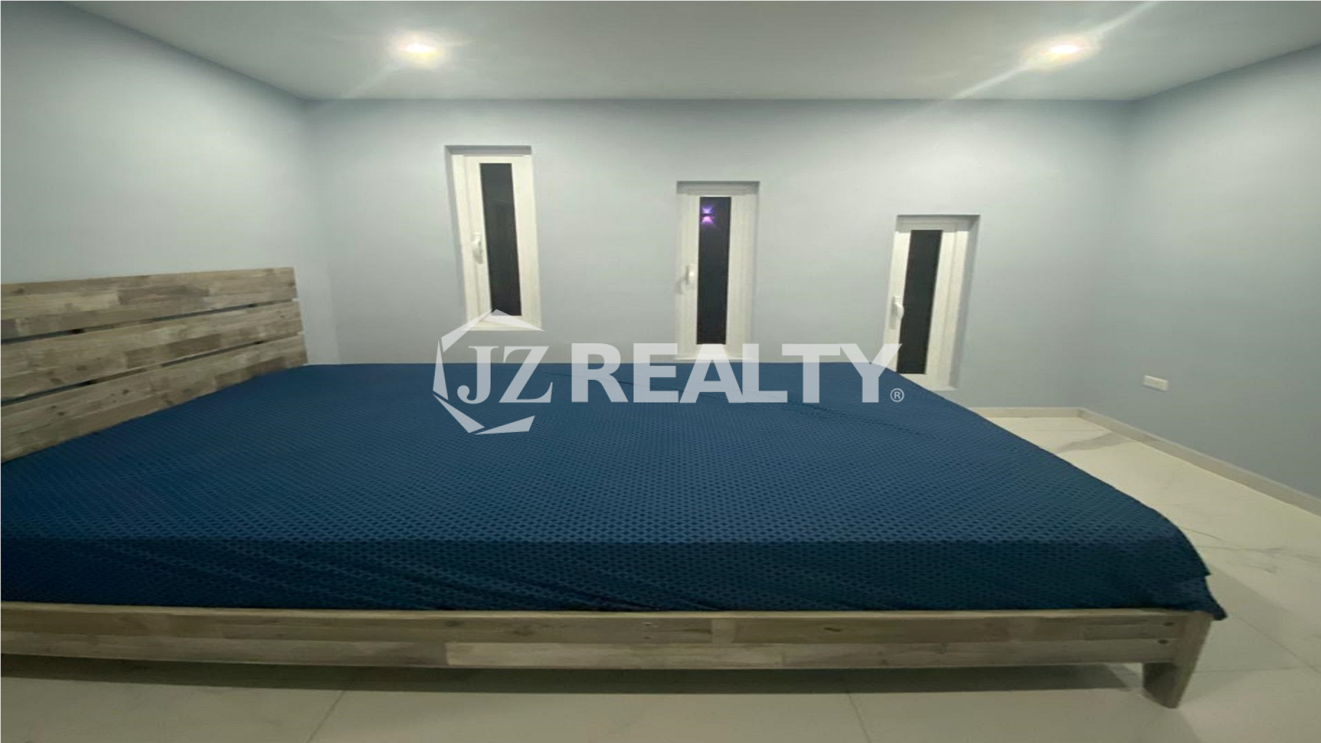 modern-aruba-bedroom-with-wooden-bedframe