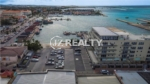 condo 317 building aerial view with marina and harbor
