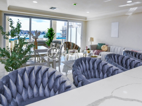 condo 214 living area with large windows and marina views