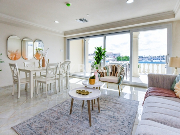 condo 214 living room with sliding doors to harbor balcony