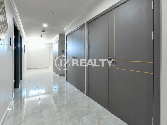 condo 312 building hallway with contemporary gray unit doors