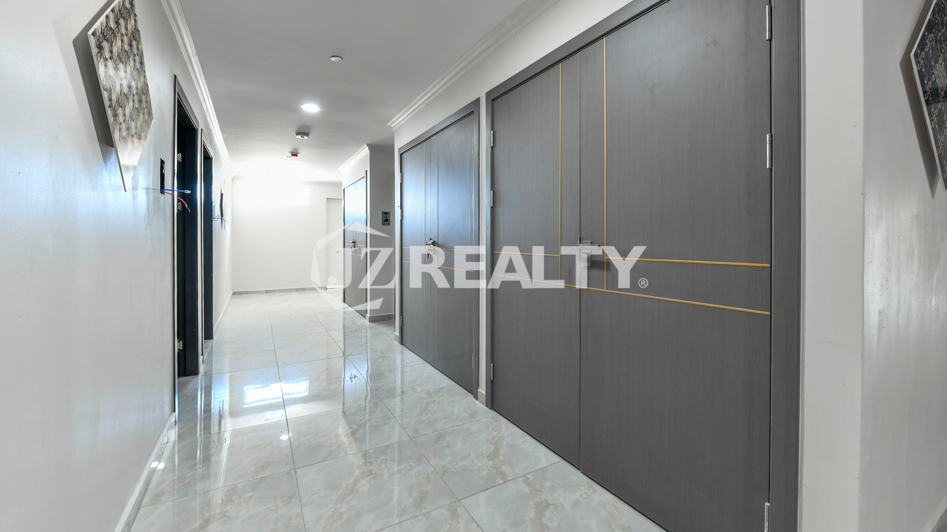 condo 312 building hallway with contemporary gray unit doors