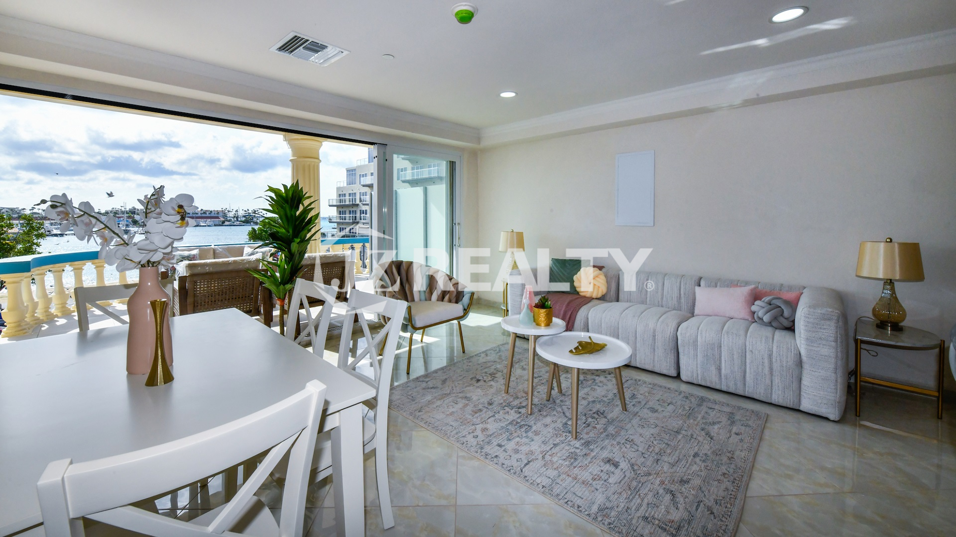 condo 313 living room with balcony access and harbor views