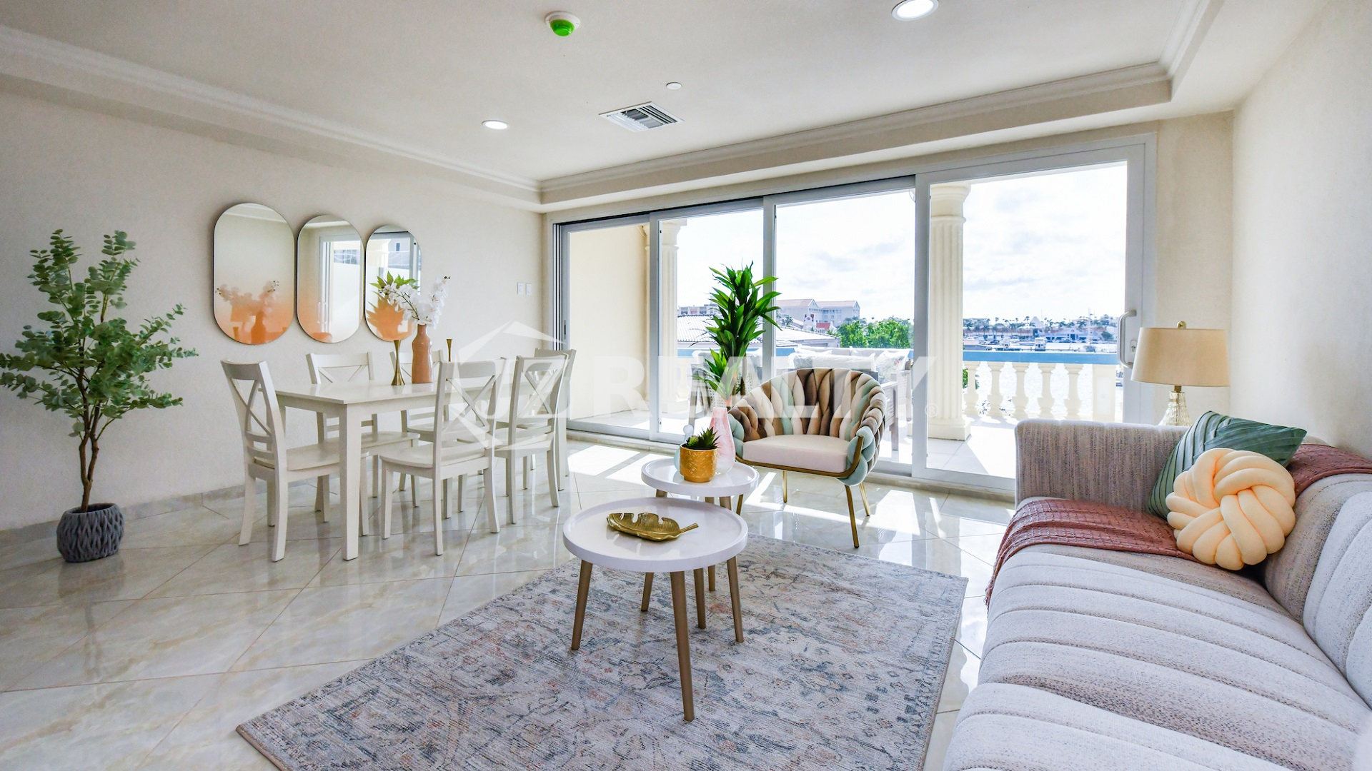 condo 313 living room with sliding doors to harbor balcony