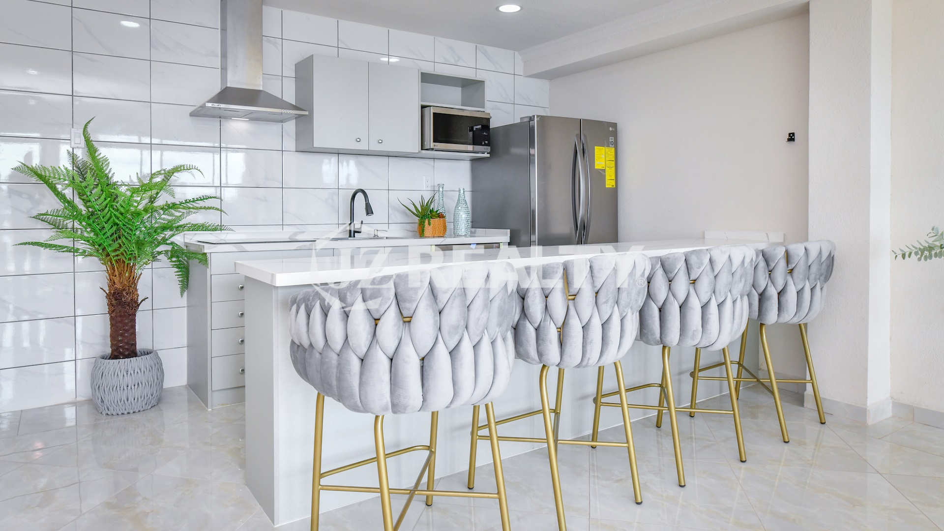 condo 314 kitchen island with designer tufted bar stools