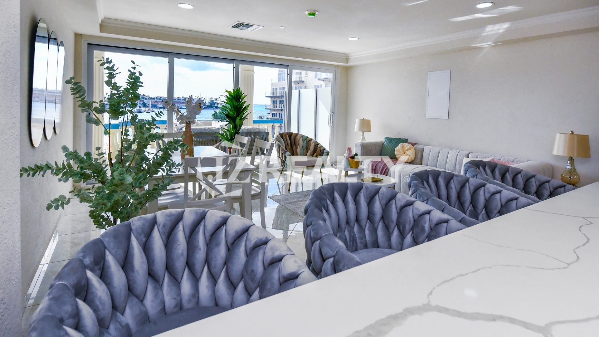 condo 314 living area with large windows and marina views