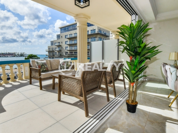 condo 318 balcony with wicker seating and marina views