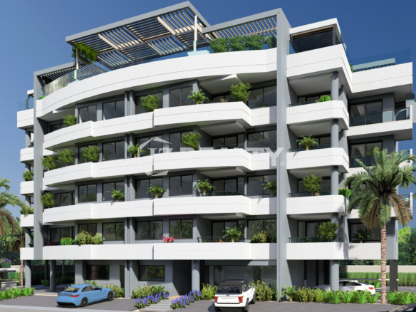 Modern five-story Kukwisa Residences condominium in Ponton near Hato Aruba, offering luxury condos for sale with balconies and urban design.