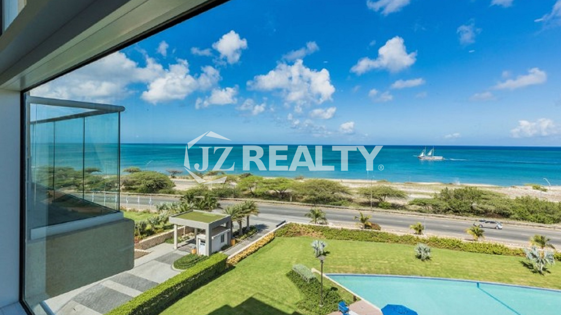 Condo 2-Bedroom Unit Blue Aruba balcony with sea view and greenery