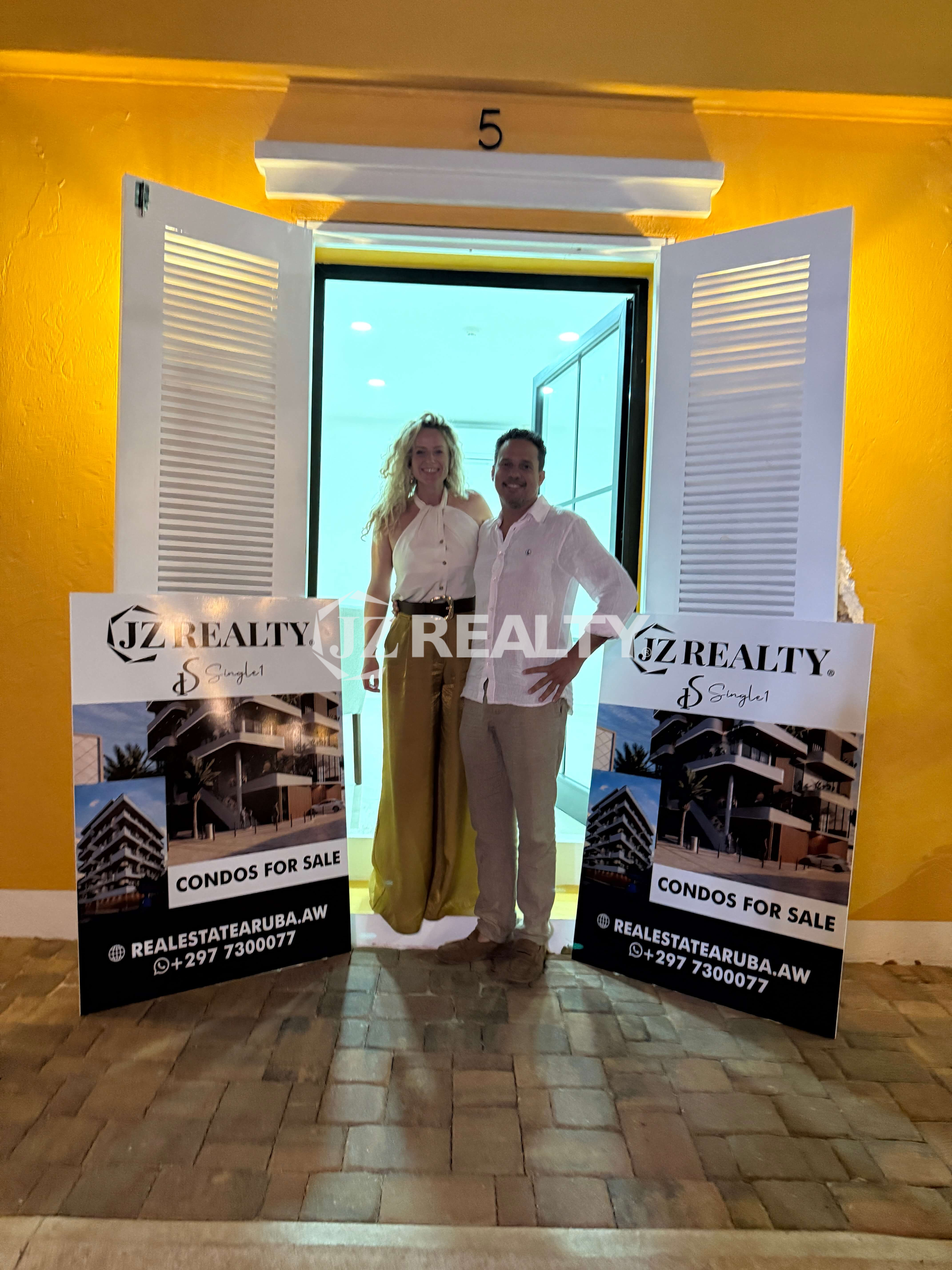 JZ Realty Aruba founders celebrating the opening of their new office for Real Estate Aruba Expansion