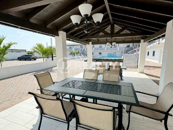 View from the covered patio toward the courtyard and pool.
