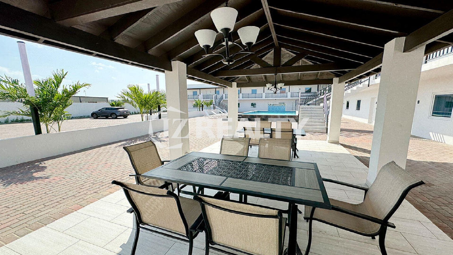View from the covered patio toward the courtyard and pool.
