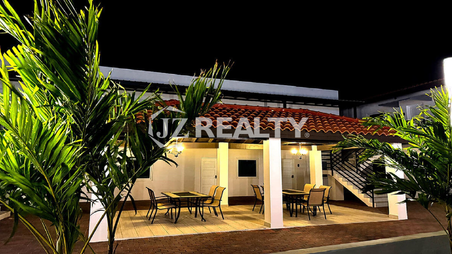 Night view of the outdoor covered dining patio.