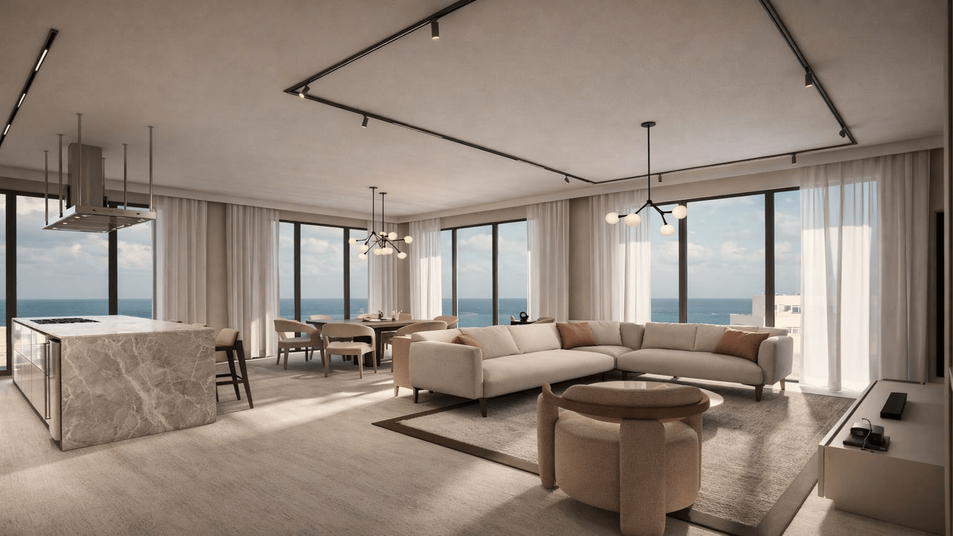 Open living room with sectional sofa and ocean view windows in LAquila Residences Unit A 101 Aruba