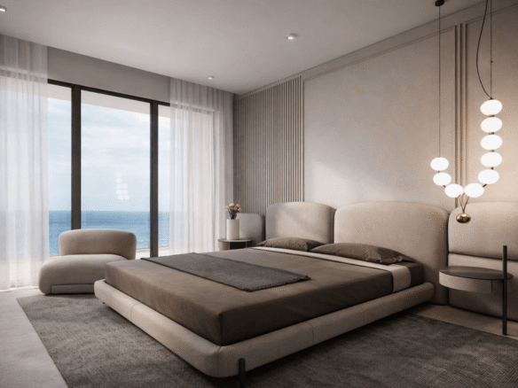Master bedroom with large bed, soft lighting, and ocean view in LAquila Residences Unit A 101 Aruba