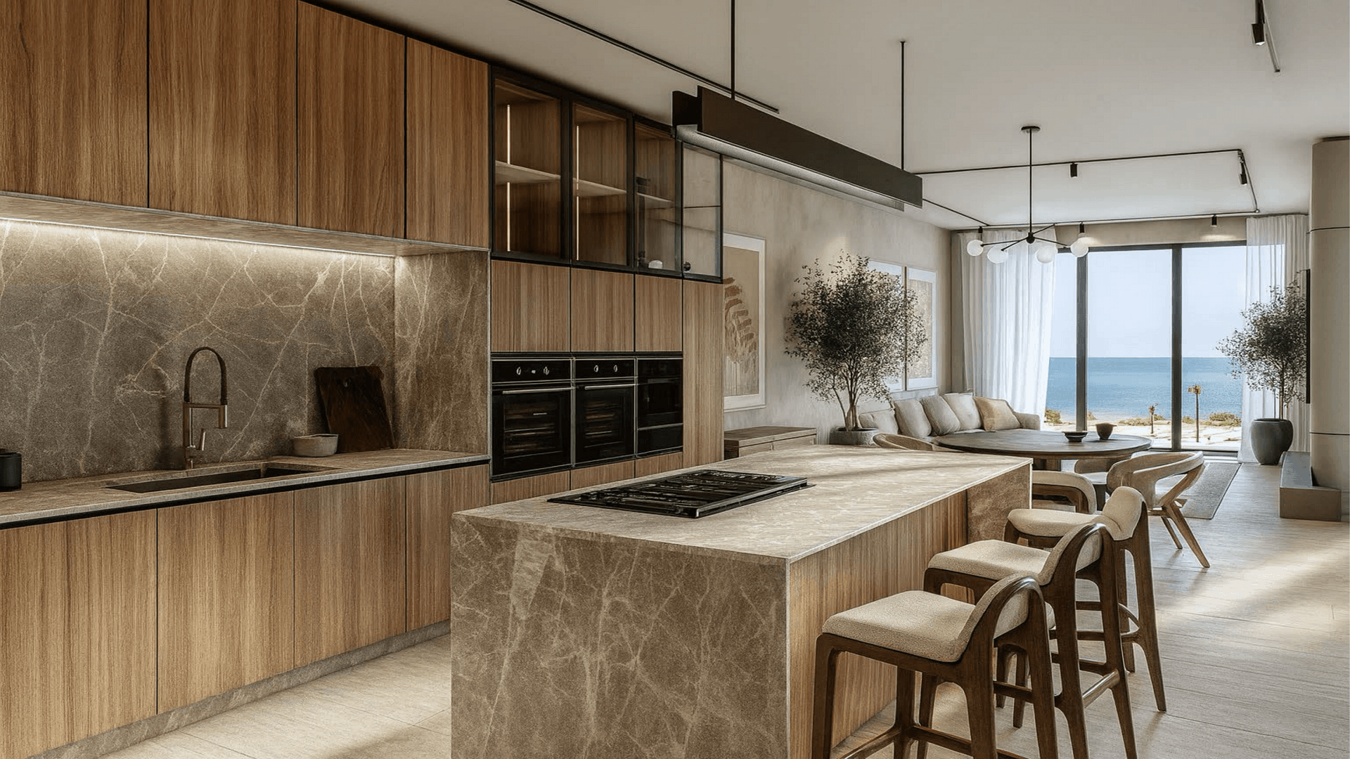 Kitchen with island and dining area in LAquila Residences Unit 103 type B condo in Aruba