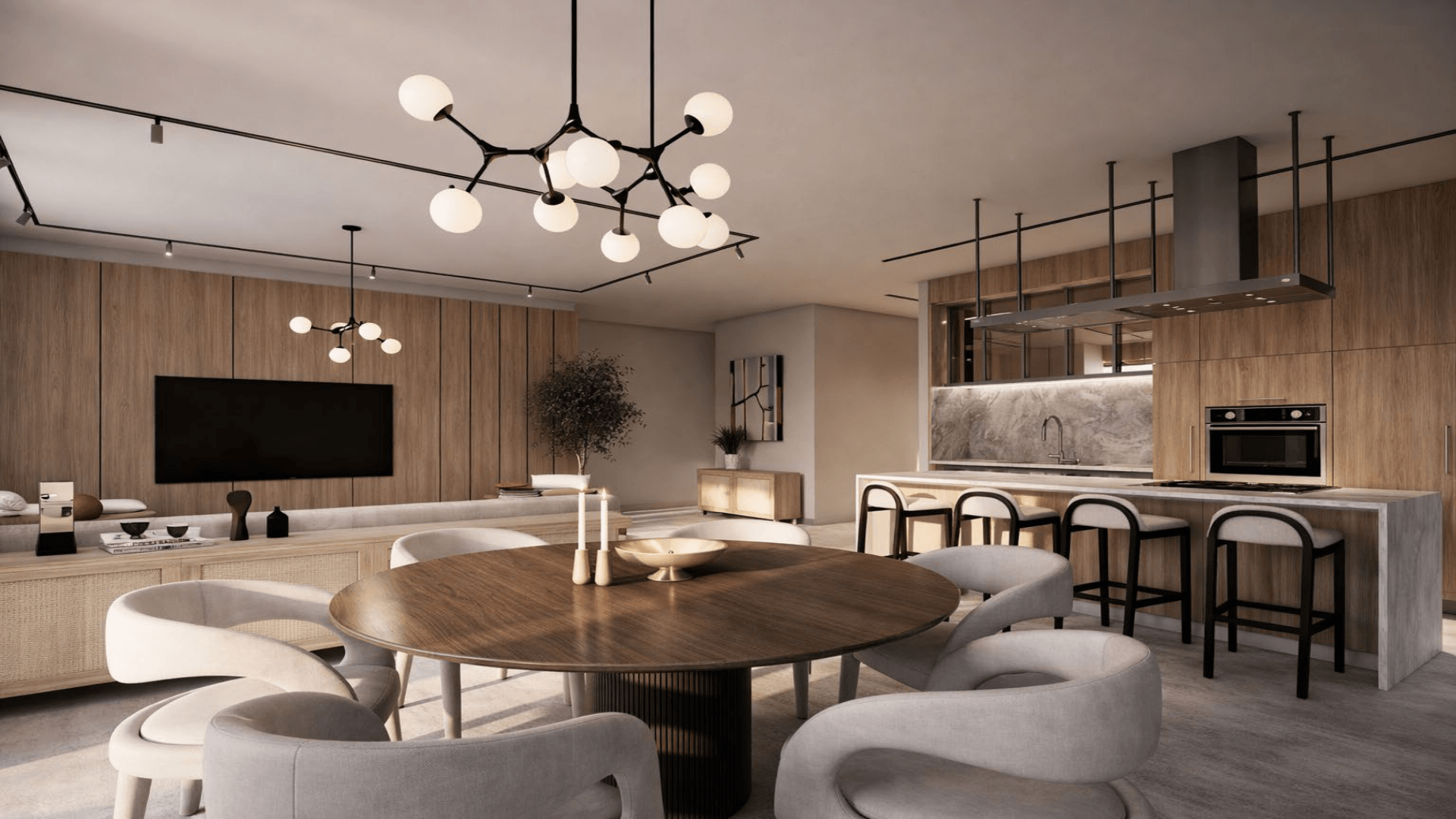 Dining area with round table and kitchen bar seating in LAquila Residences Unit 110 type E condo in Aruba