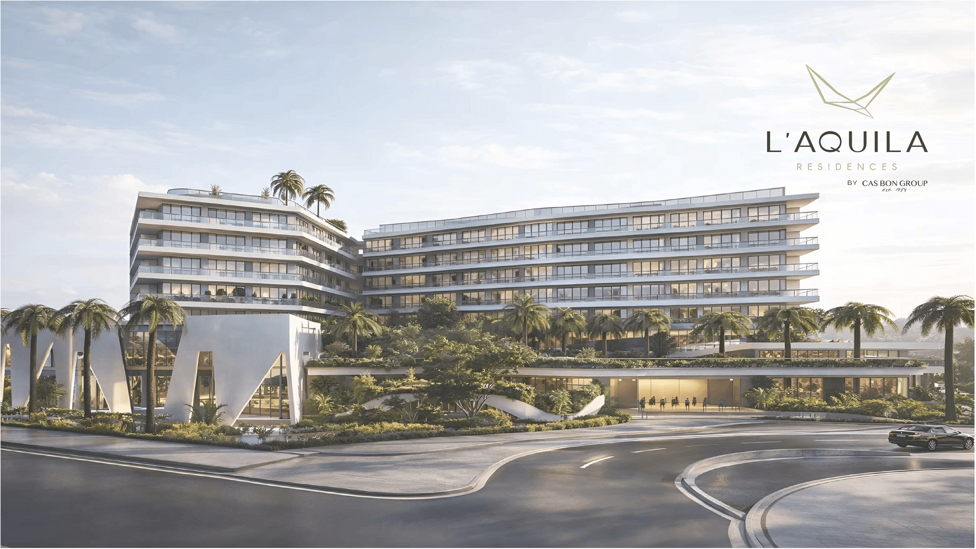 Exterior view of L’Aquila Residences building with landscaping in Aruba