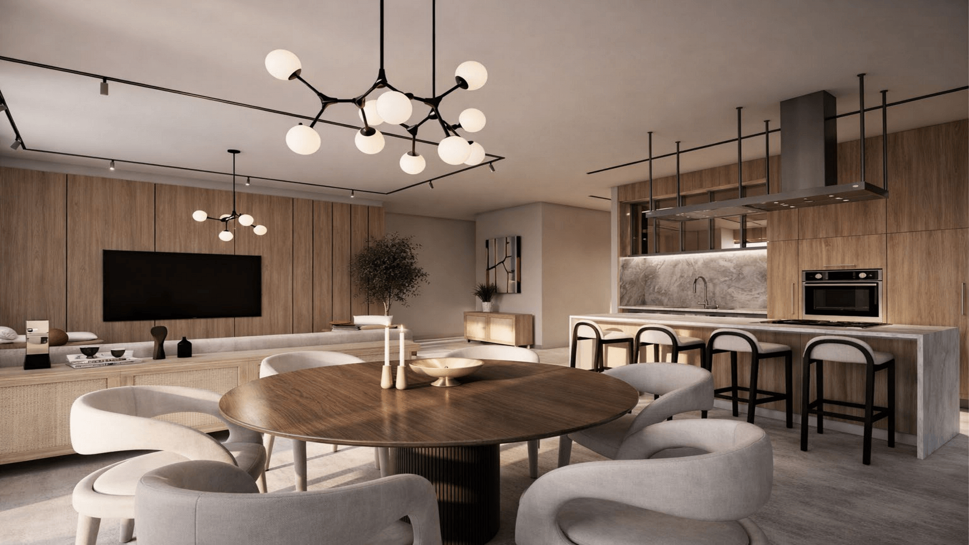 Dining area with round table and modern seating in LAquila Residences Type A condo in Aruba