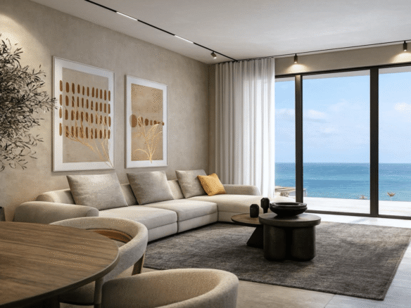 Living room of L’Aquila Residences Unit 707 Type G with modern furniture large windows and ocean view in Aruba