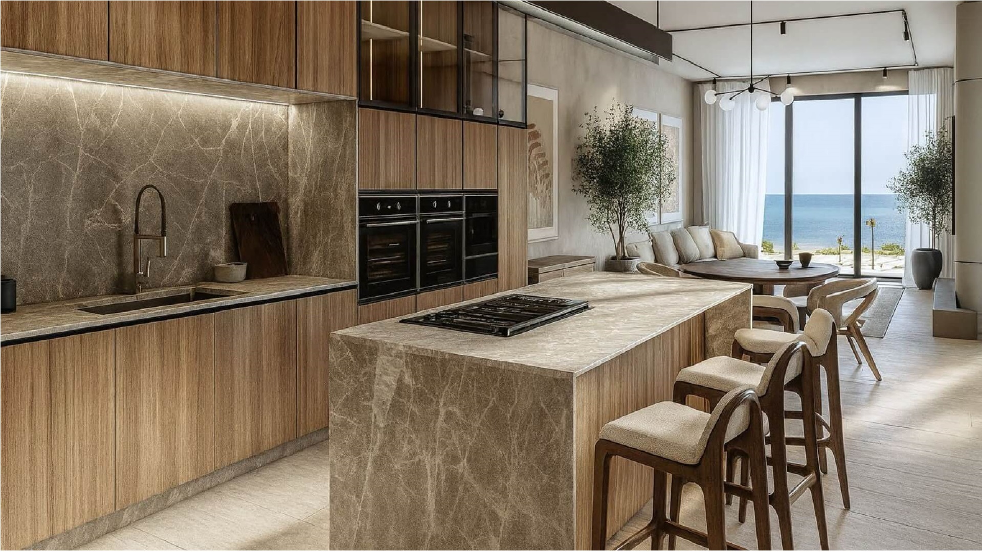 Type B Unit 502 kitchen and dining area with modern cabinetry and island at L’Aquila Residences Aruba