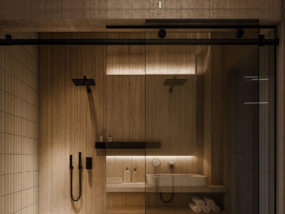 Modern bathroom shower with glass enclosure and dual shower heads in L’Aquila Residences Unit 604 Type B Aruba