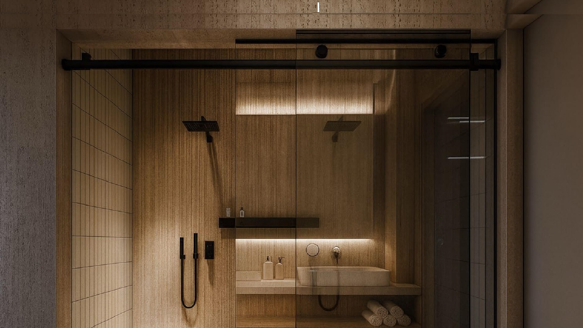 Modern bathroom shower with glass enclosure and dual shower heads in L’Aquila Residences Unit 604 Type B Aruba