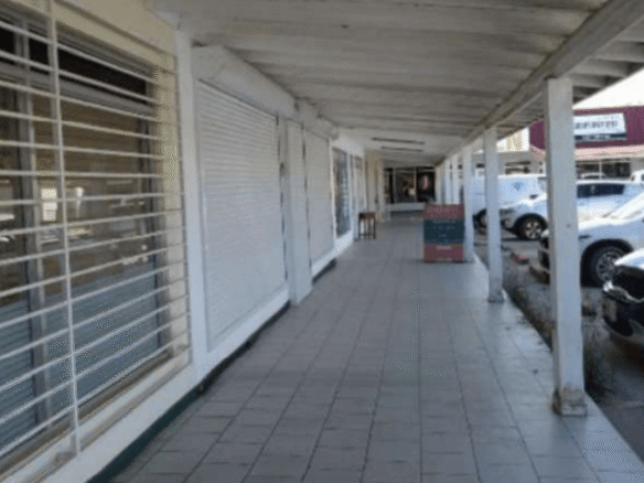 Commercial 69 Bubali exterior corridor with parking